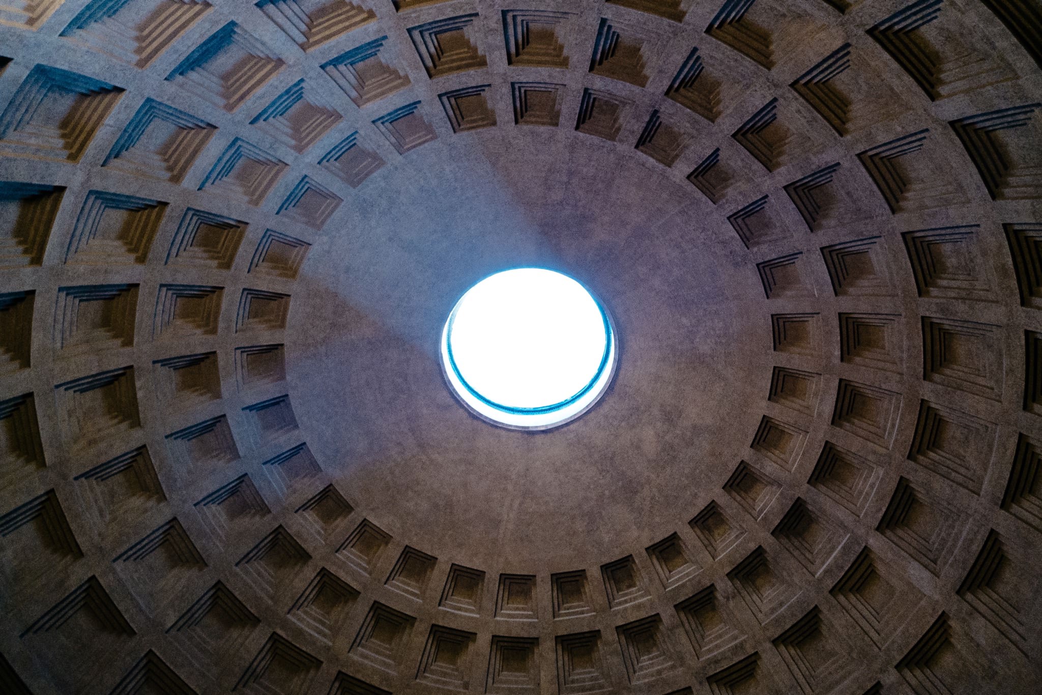 Pantheon dome interior with oculus and coffered ceiling.