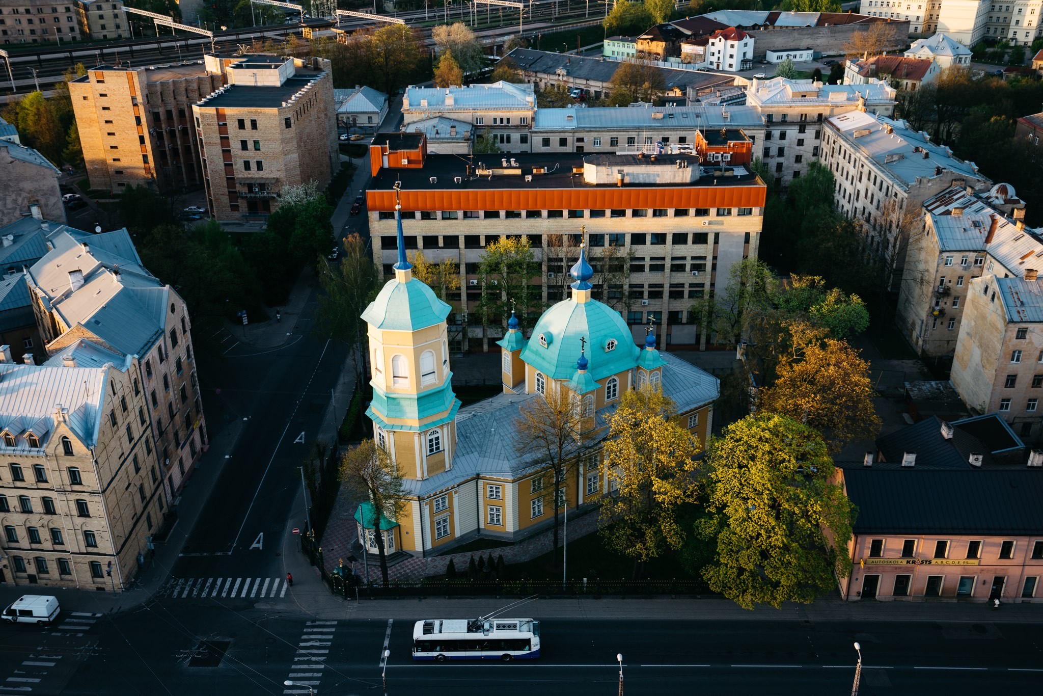 Aerial view of a church with teal domes in Riga, Latvia.