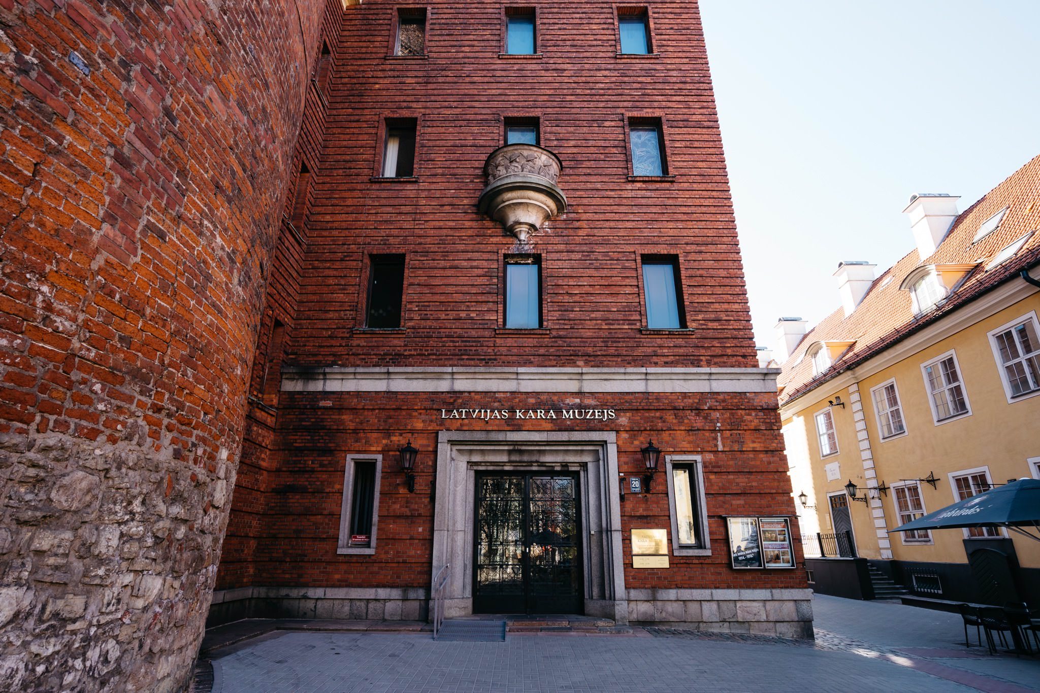 Latvian War Museum in Riga, Latvia. Brick building with ornate entrance.
