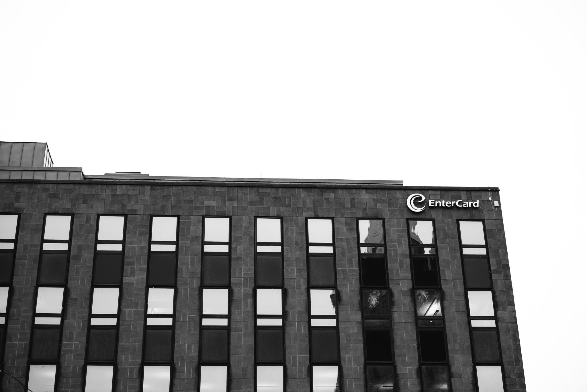 Black and white photo of the EnterCard building in Stockholm, Sweden.