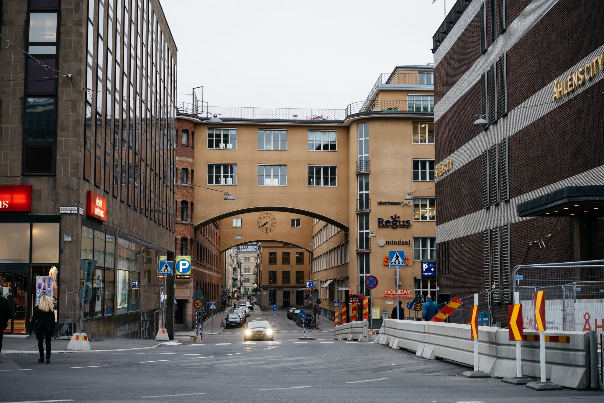 Stockholm street scene with buildings and a car.