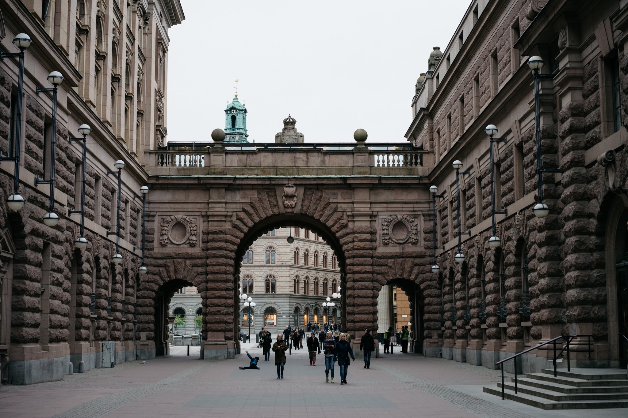 Stockholm, Sweden: Archway between stone buildings.
