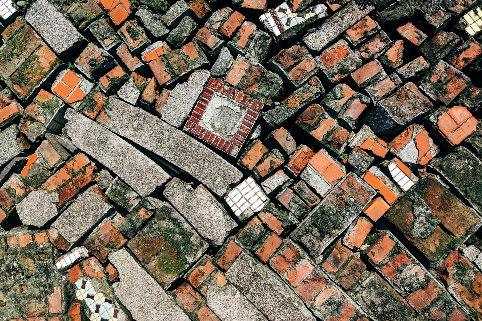 Close-up of a mosaic of broken bricks and tiles in Jiufen, Taiwan.
