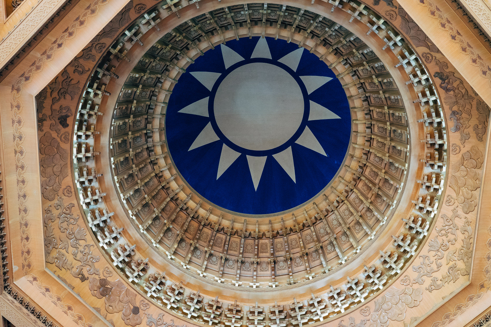 Intricate, ornate ceiling of Chiang Kai-shek Memorial Hall featuring the Taiwanese flag.