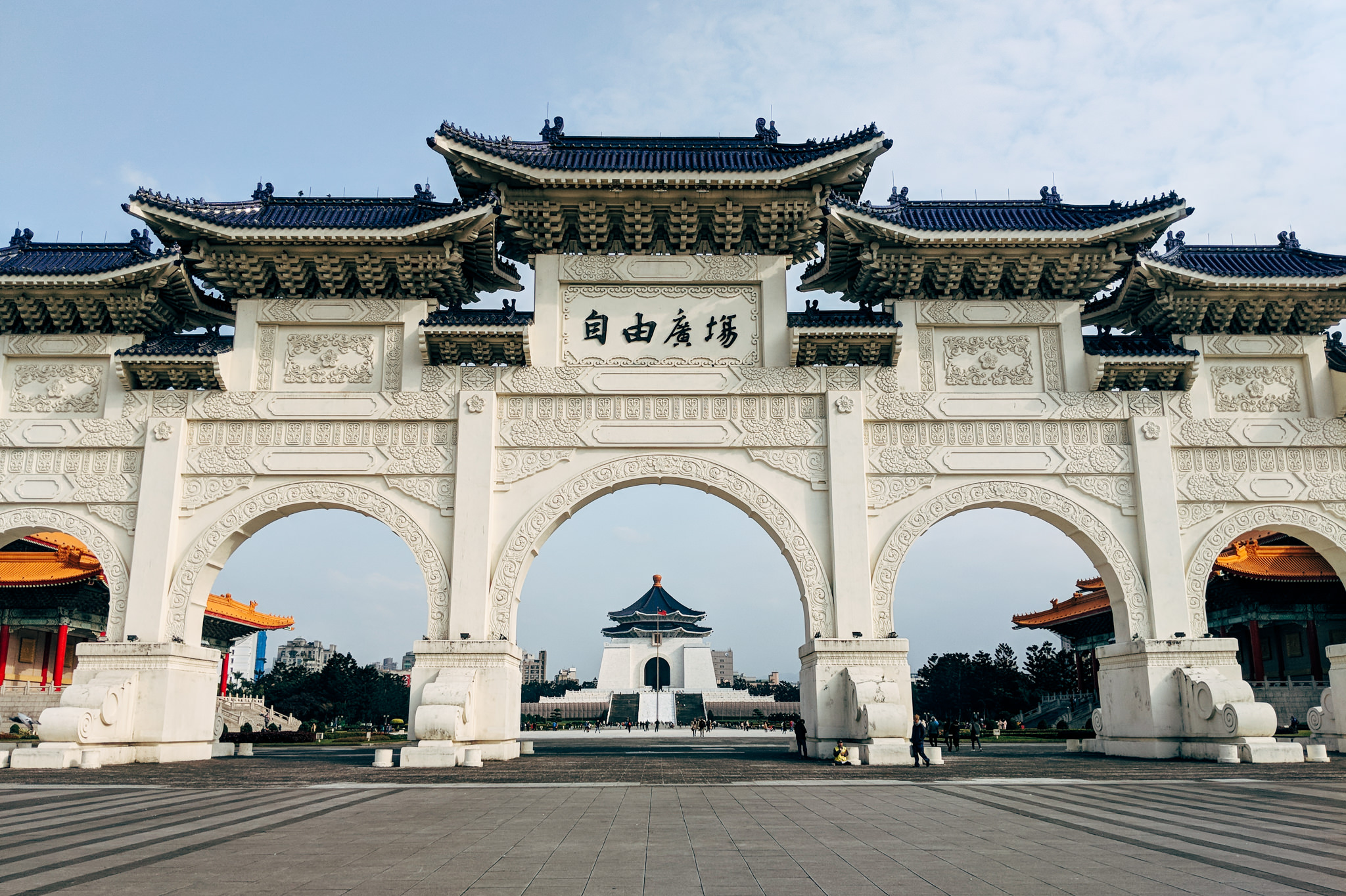 Liberty Square main gate, Taipei, with Chiang Kai-shek Memorial Hall visible through the arch.