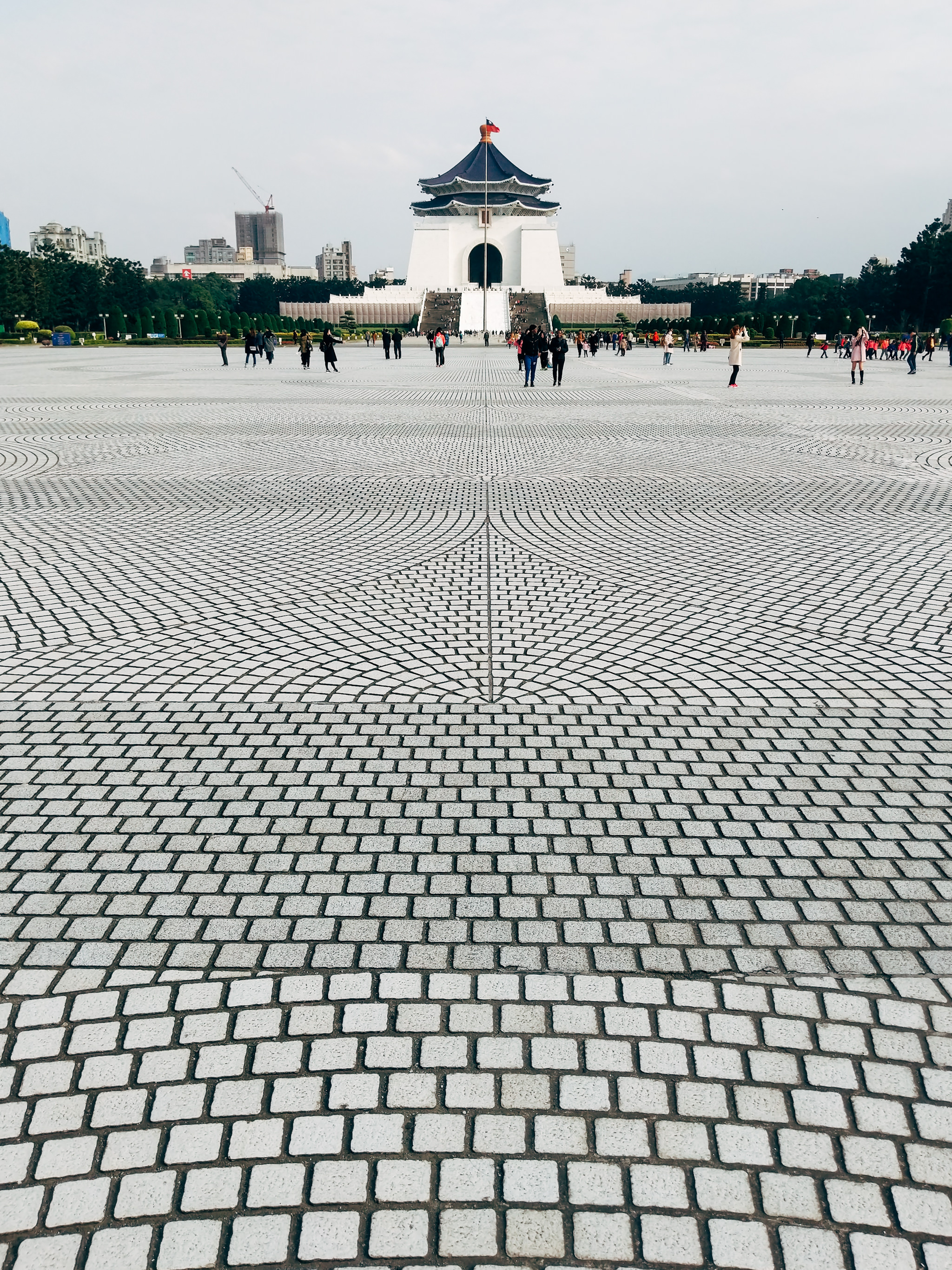 Taiwan National Monument, Taipei, with patterned plaza in foreground.