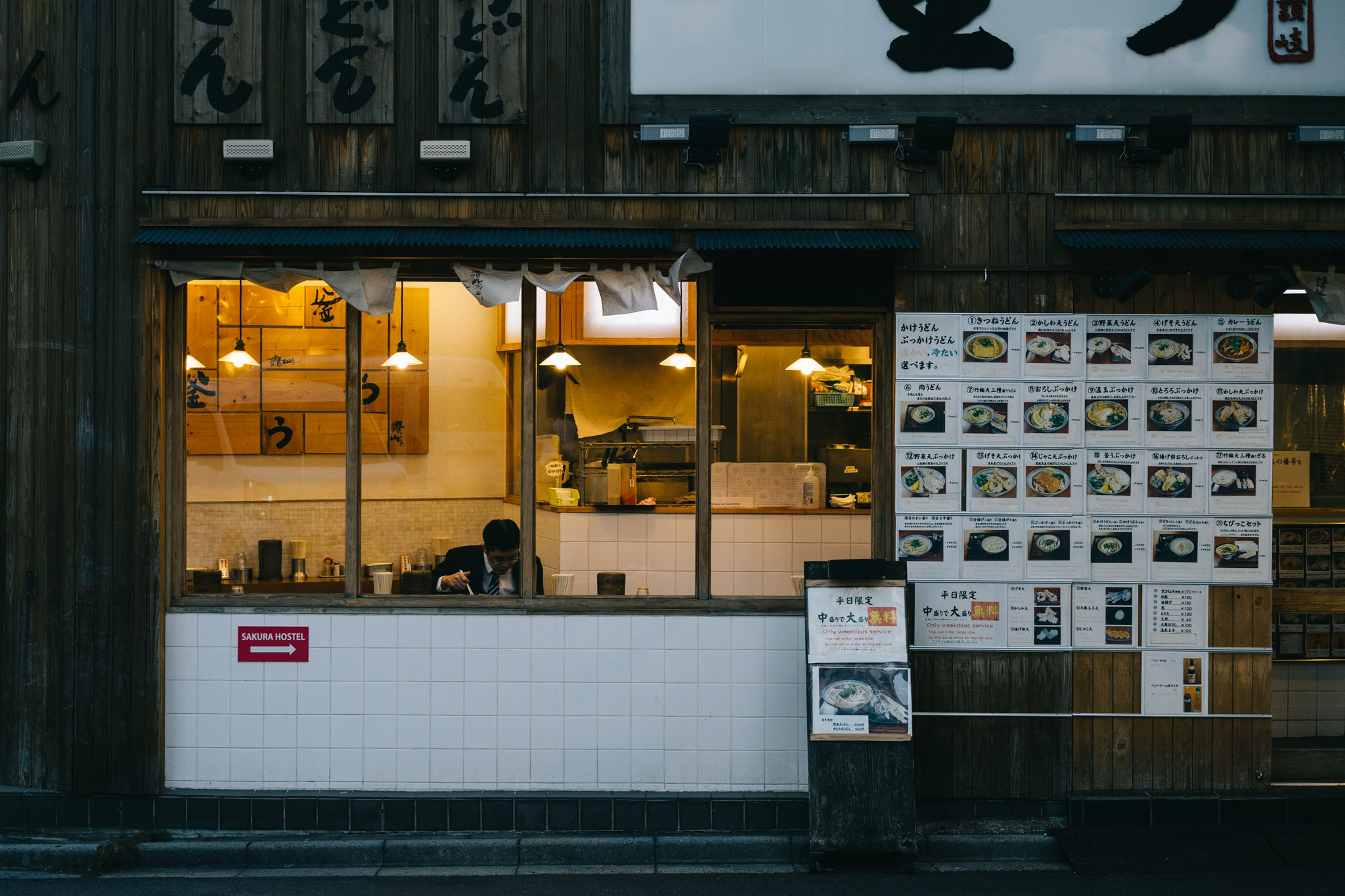 Man eating in a Tokyo restaurant.
