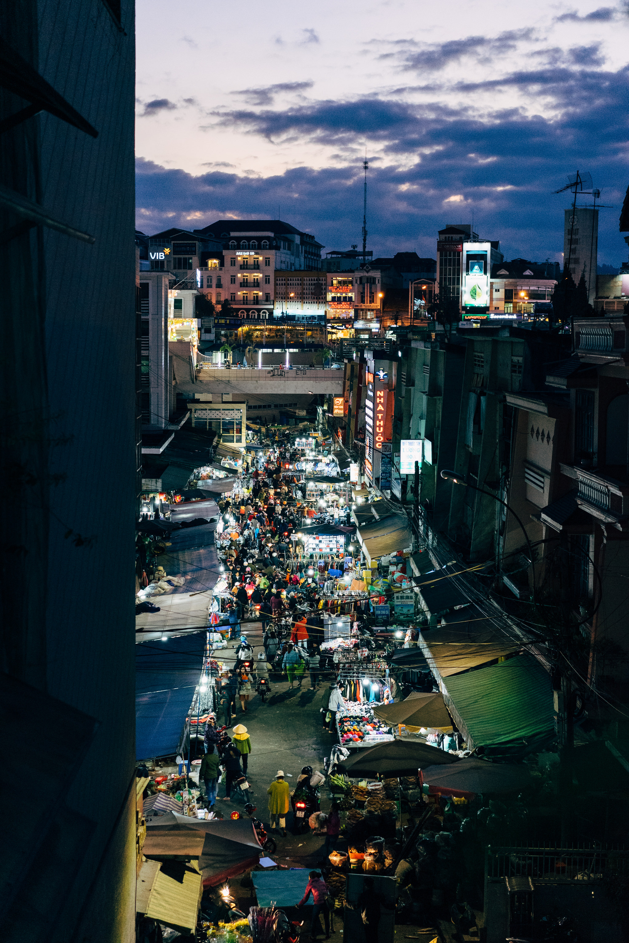 Aerial view of a bustling night market in Da Lat, Vietnam.