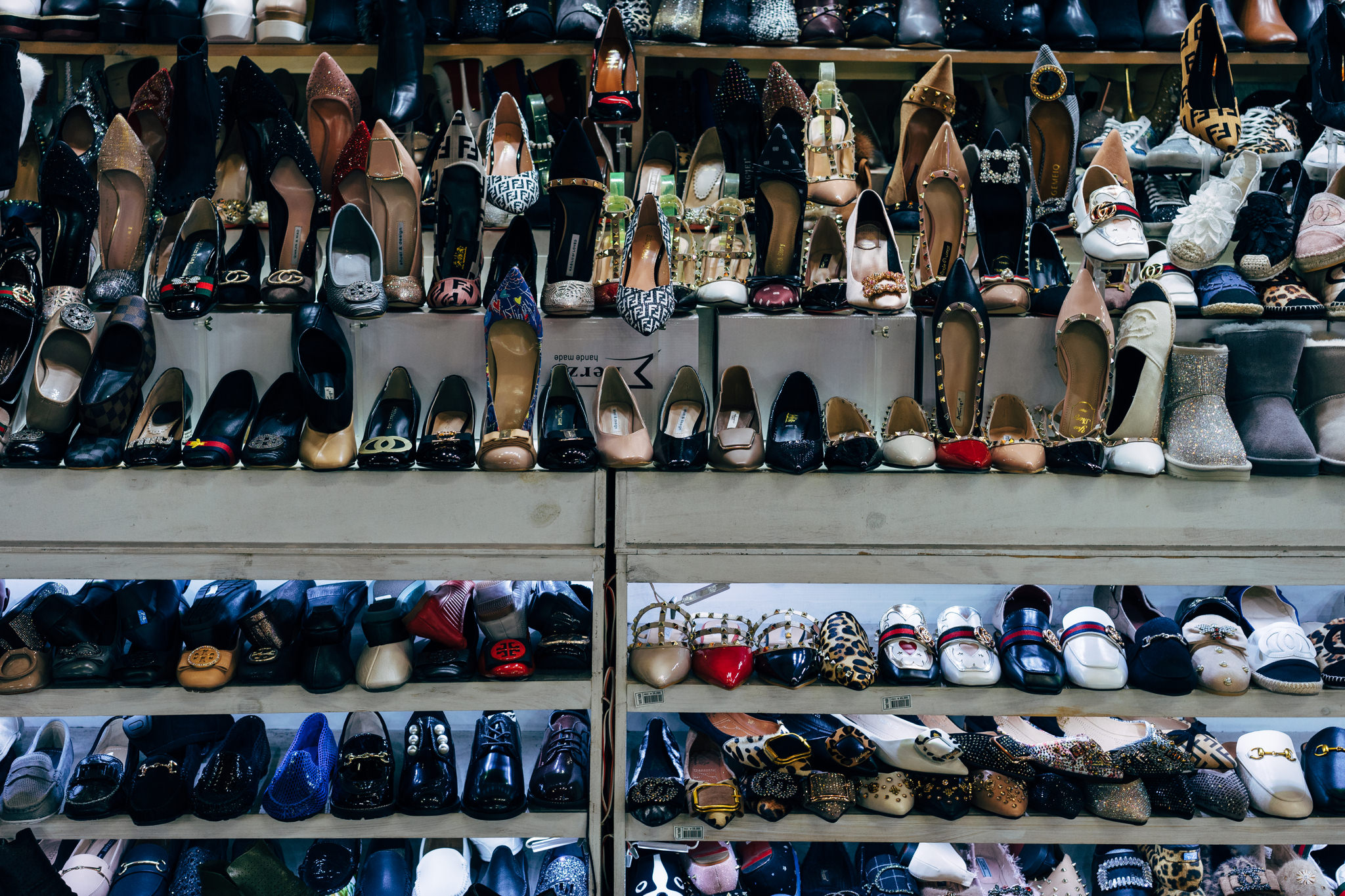 Seoul shoe shop shelves filled with women's shoes.