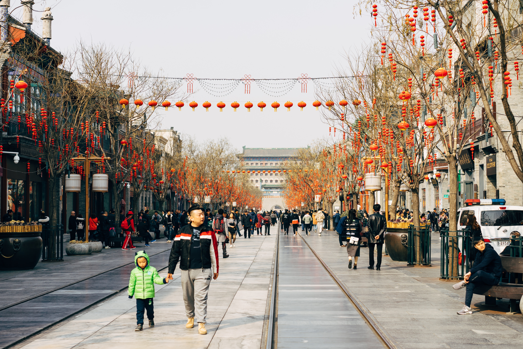 Beijing shopping street decorated with red lanterns.