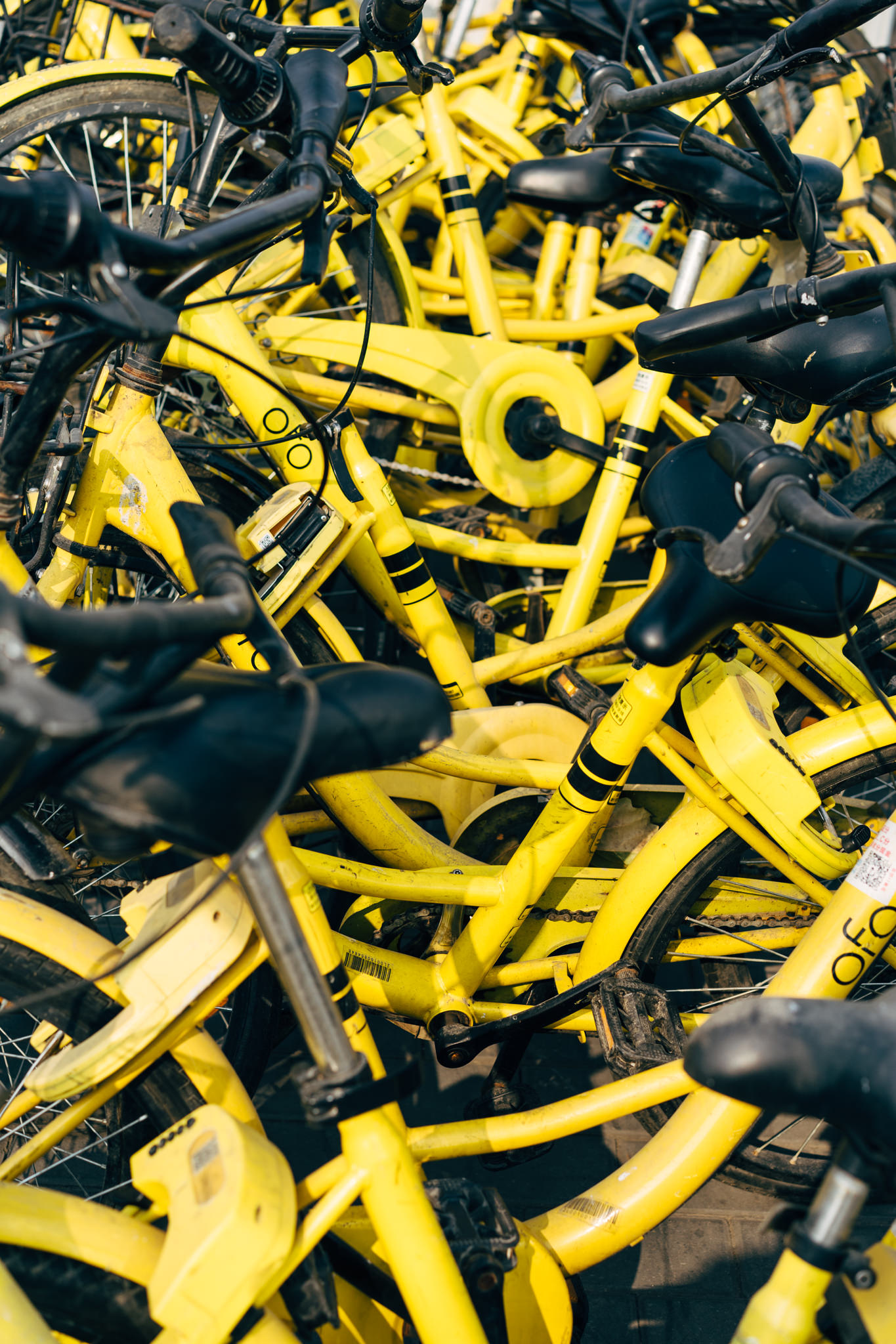 Pile of yellow shared bicycles in China.