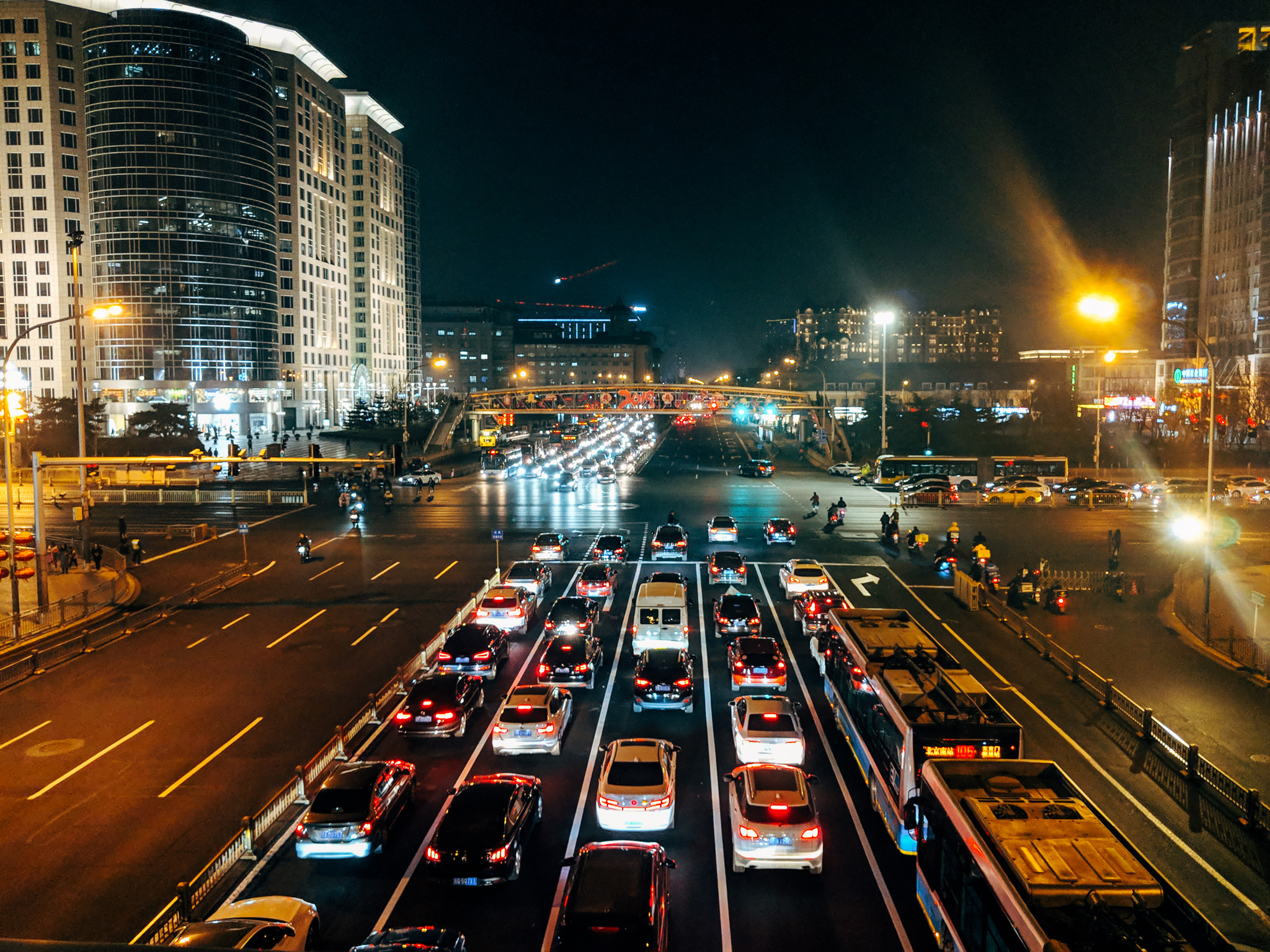 Nighttime traffic jam in Beijing, viewed from an overpass.