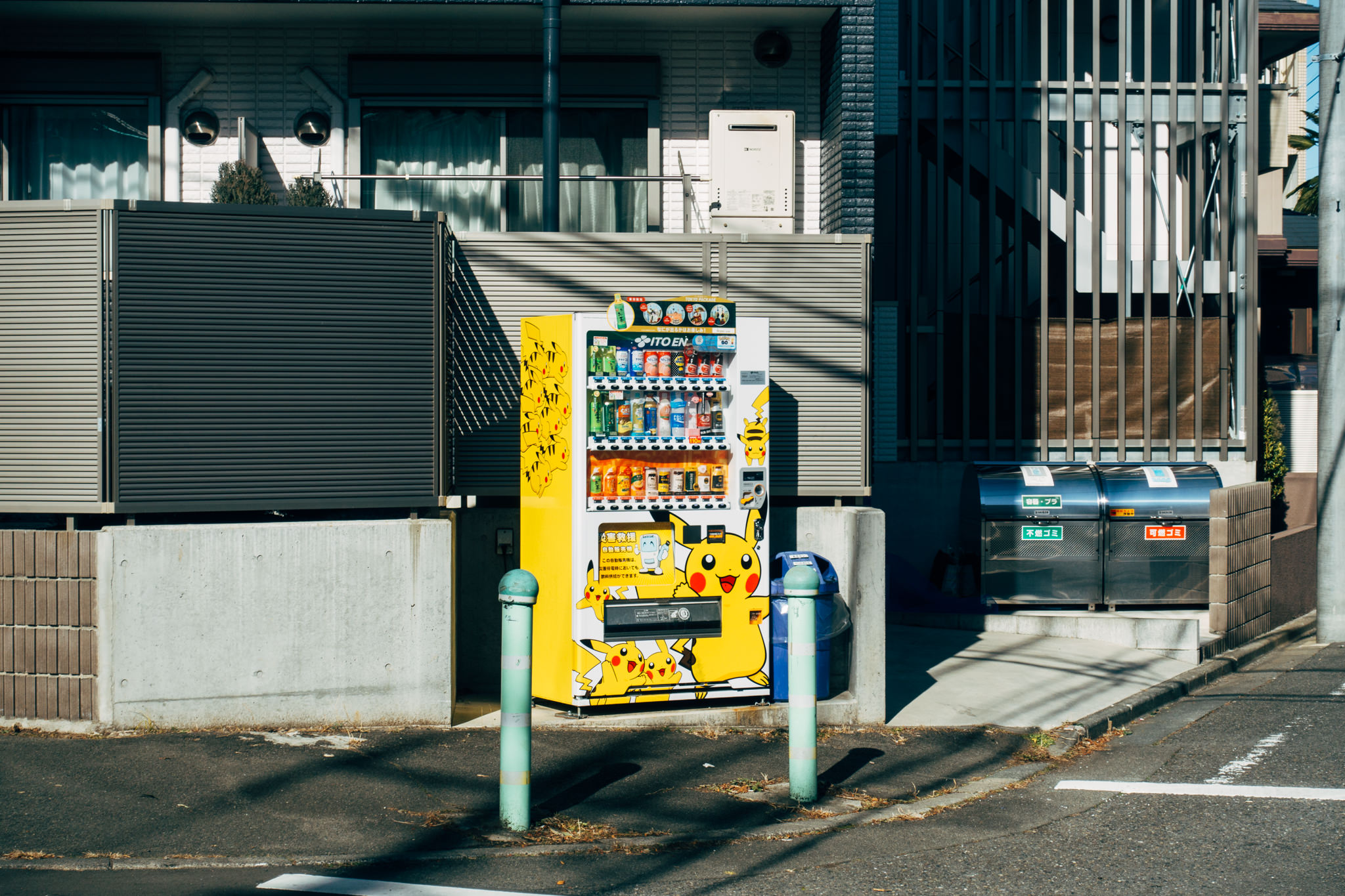 Pikachu-themed vending machine in Japan dispensing beverages.
