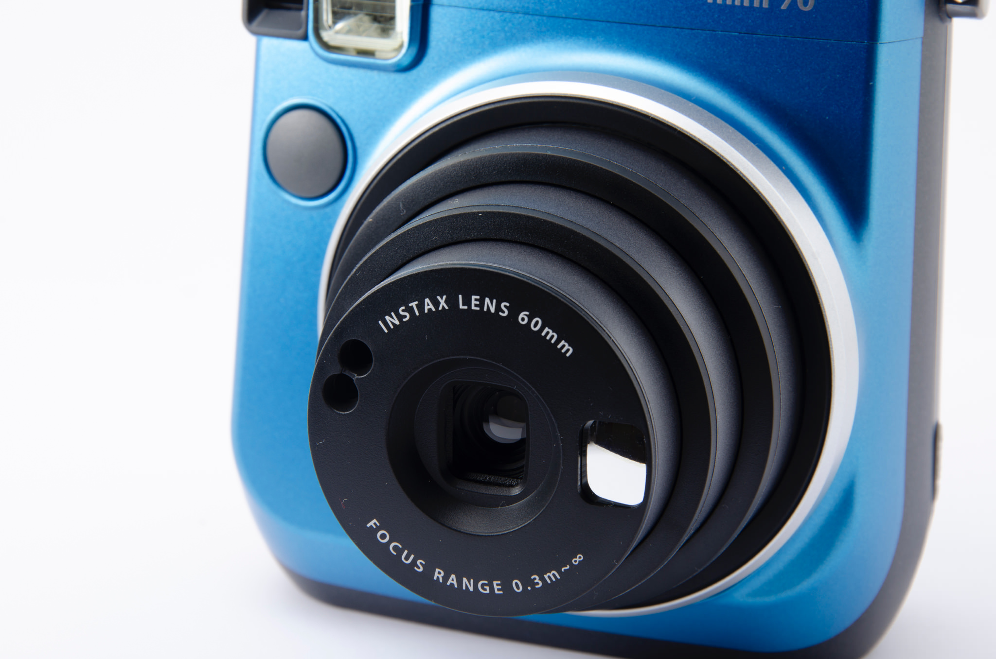 Blue Fujifilm Instax Mini 70 instant camera.