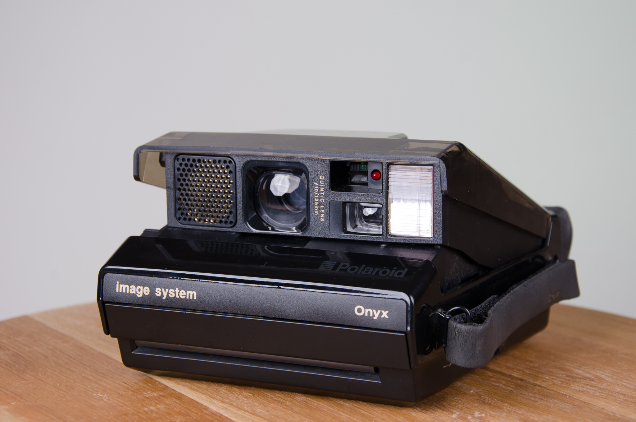 Black Polaroid Onyx instant camera.