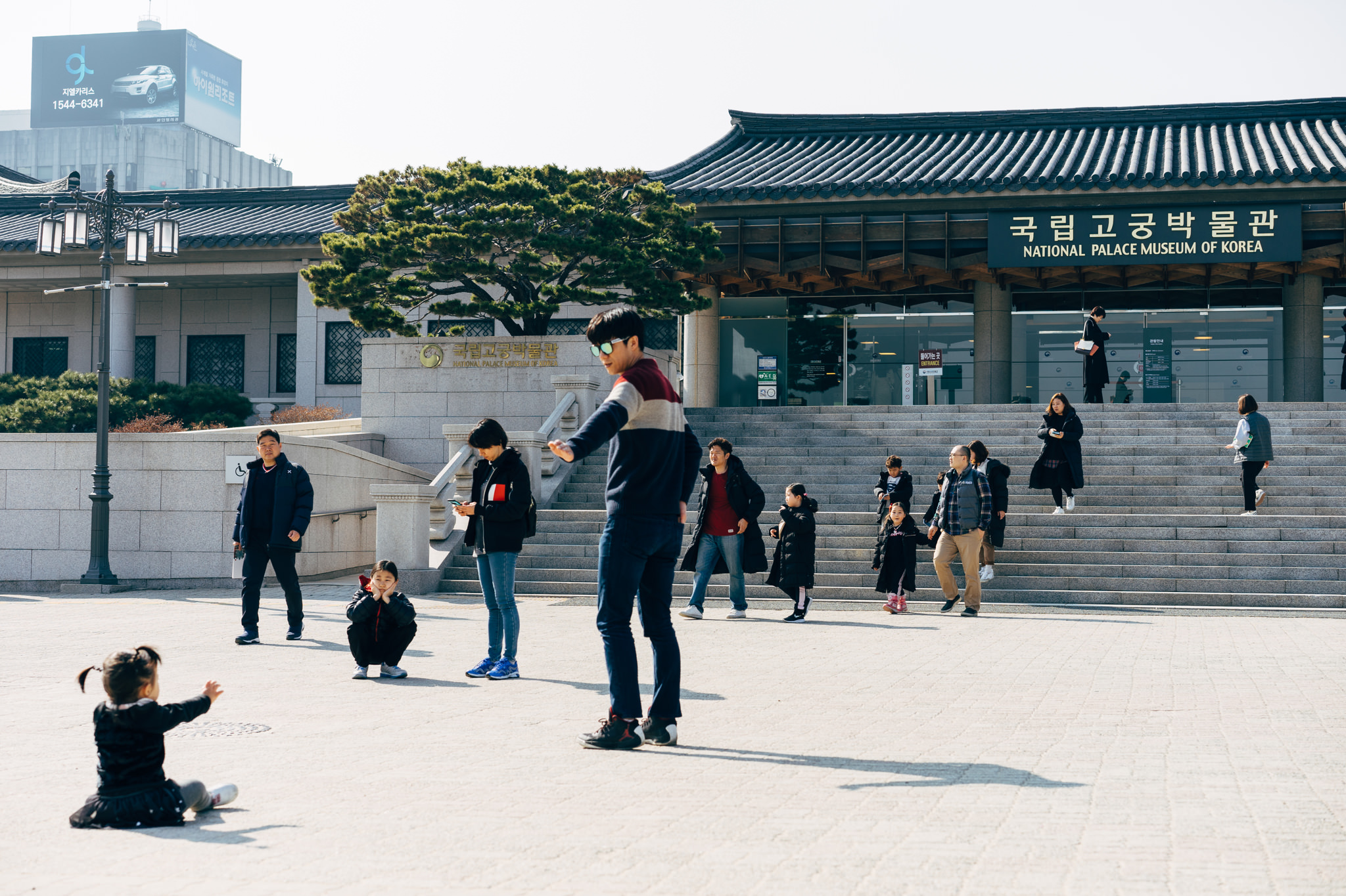 National Palace Museum of Korea with families outside.