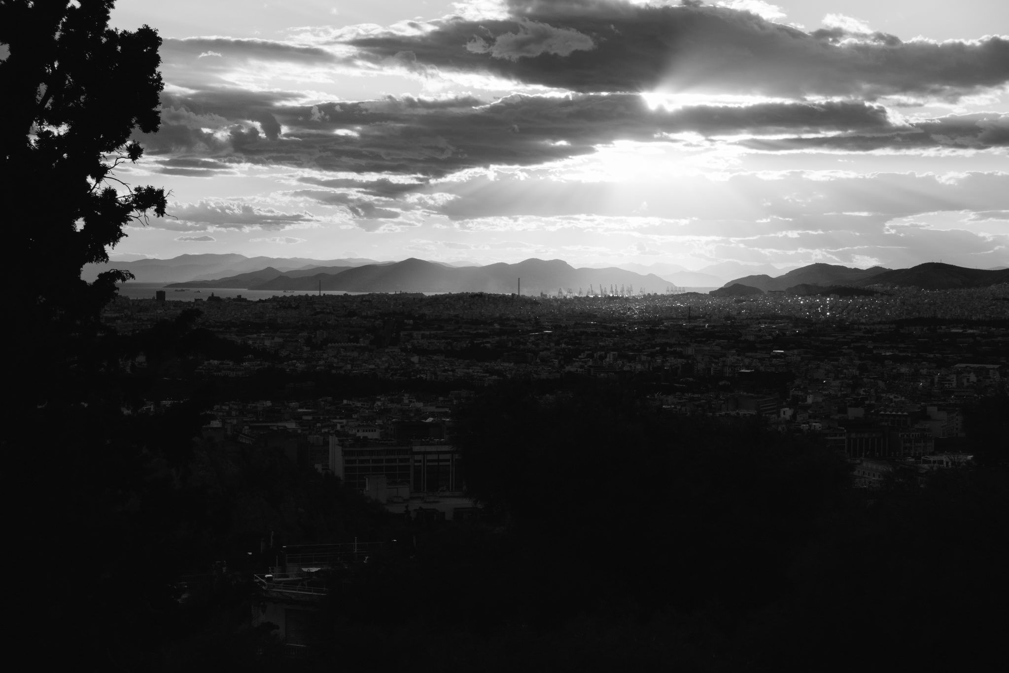 Black and white photo of Athens, Greece, at sunset, viewed from Mount Lycabettus.