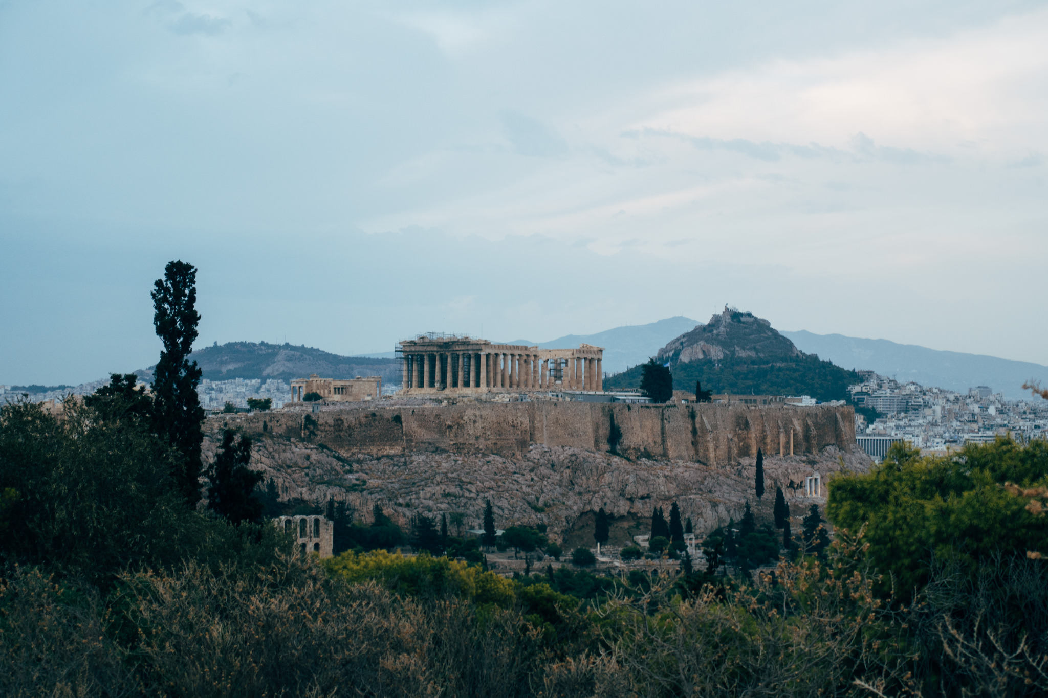 Night view of the Acropolis in Athens, Greece, seen from Philopappos Hill.