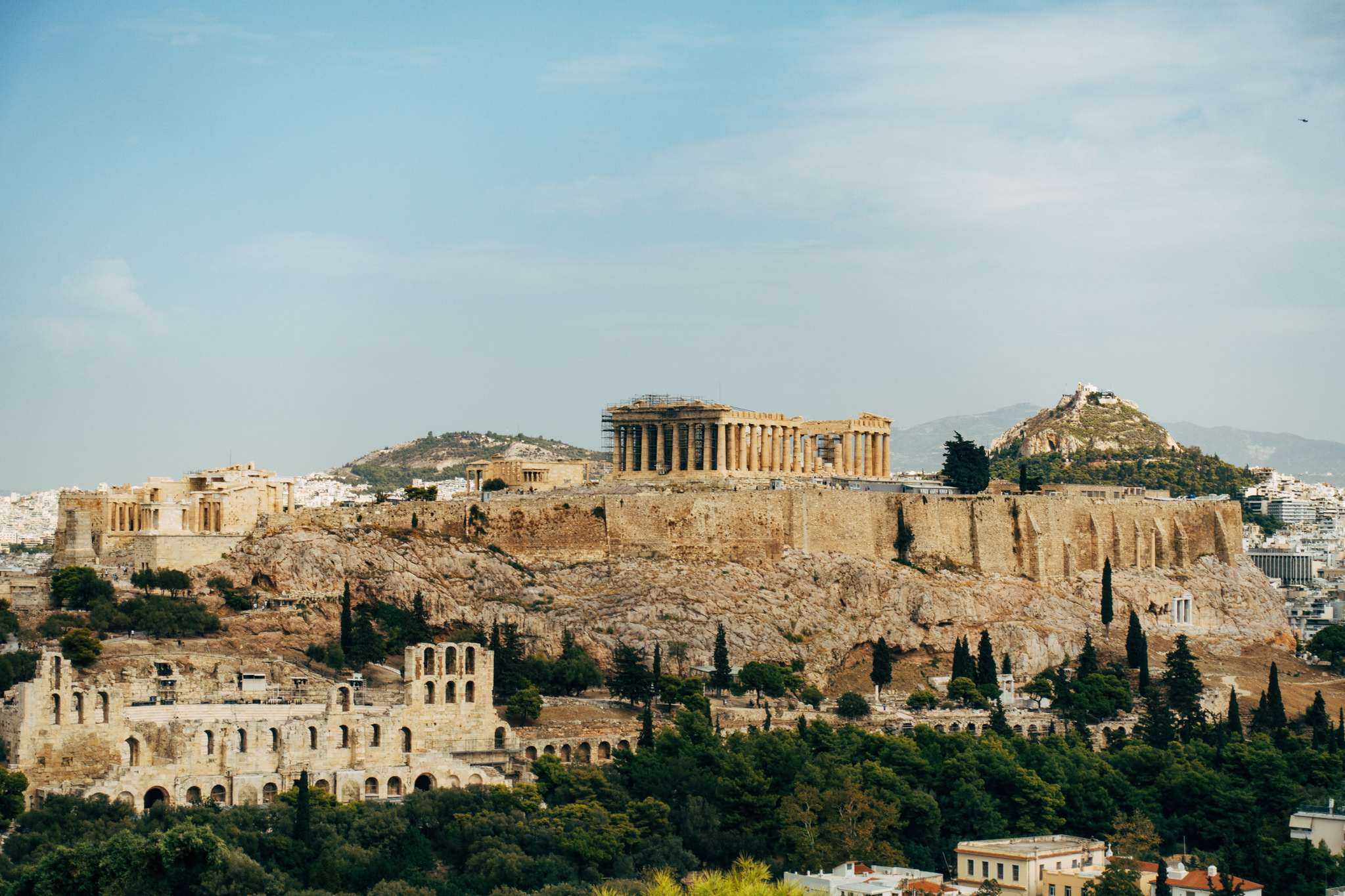 Acropolis of Athens, Greece, with the Parthenon and Odeon of Herodes Atticus.