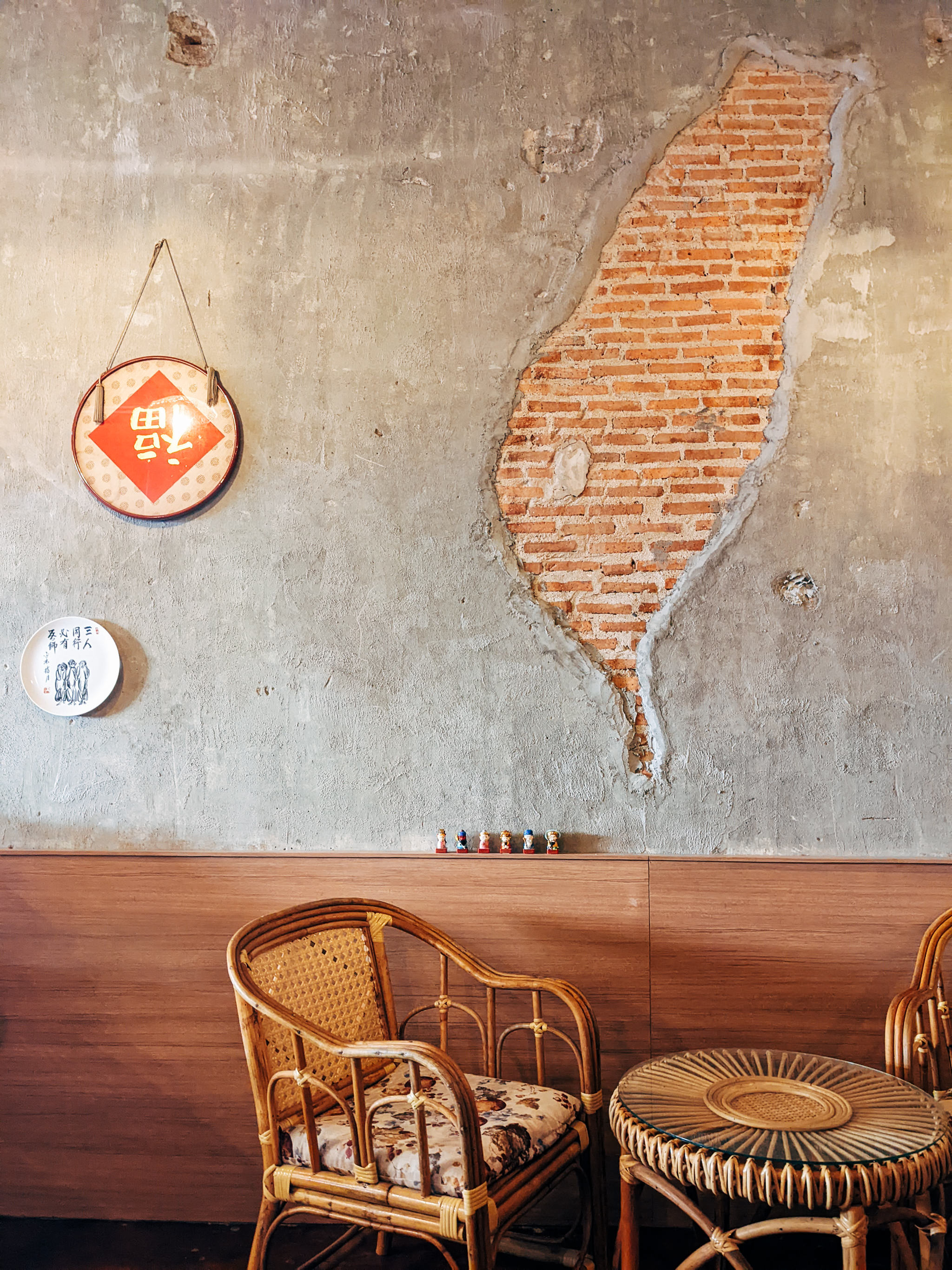 Taiwanese restaurant in Bangkok with a brick wall accent.