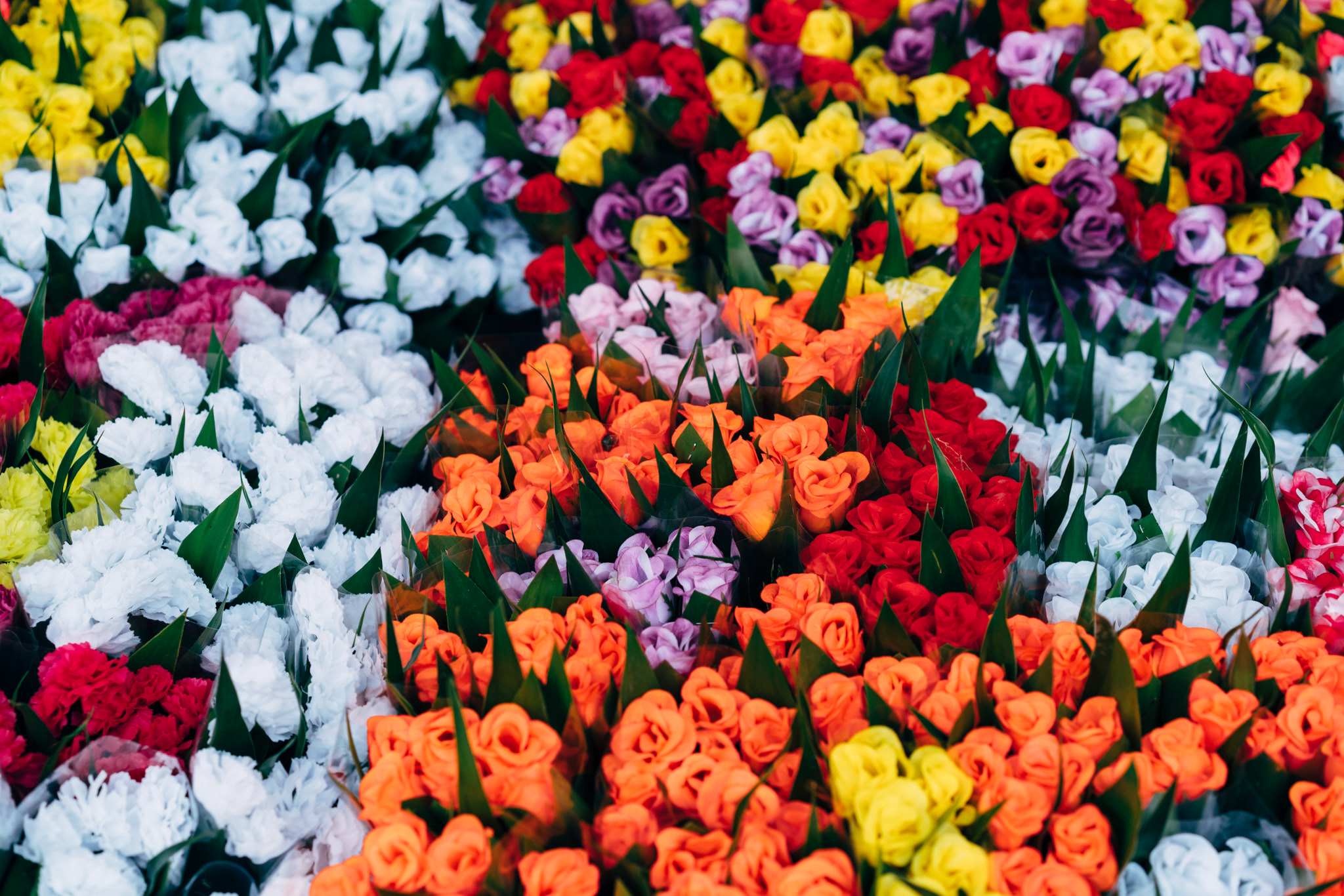 Colorful bouquets of flowers at a Thai flower market.