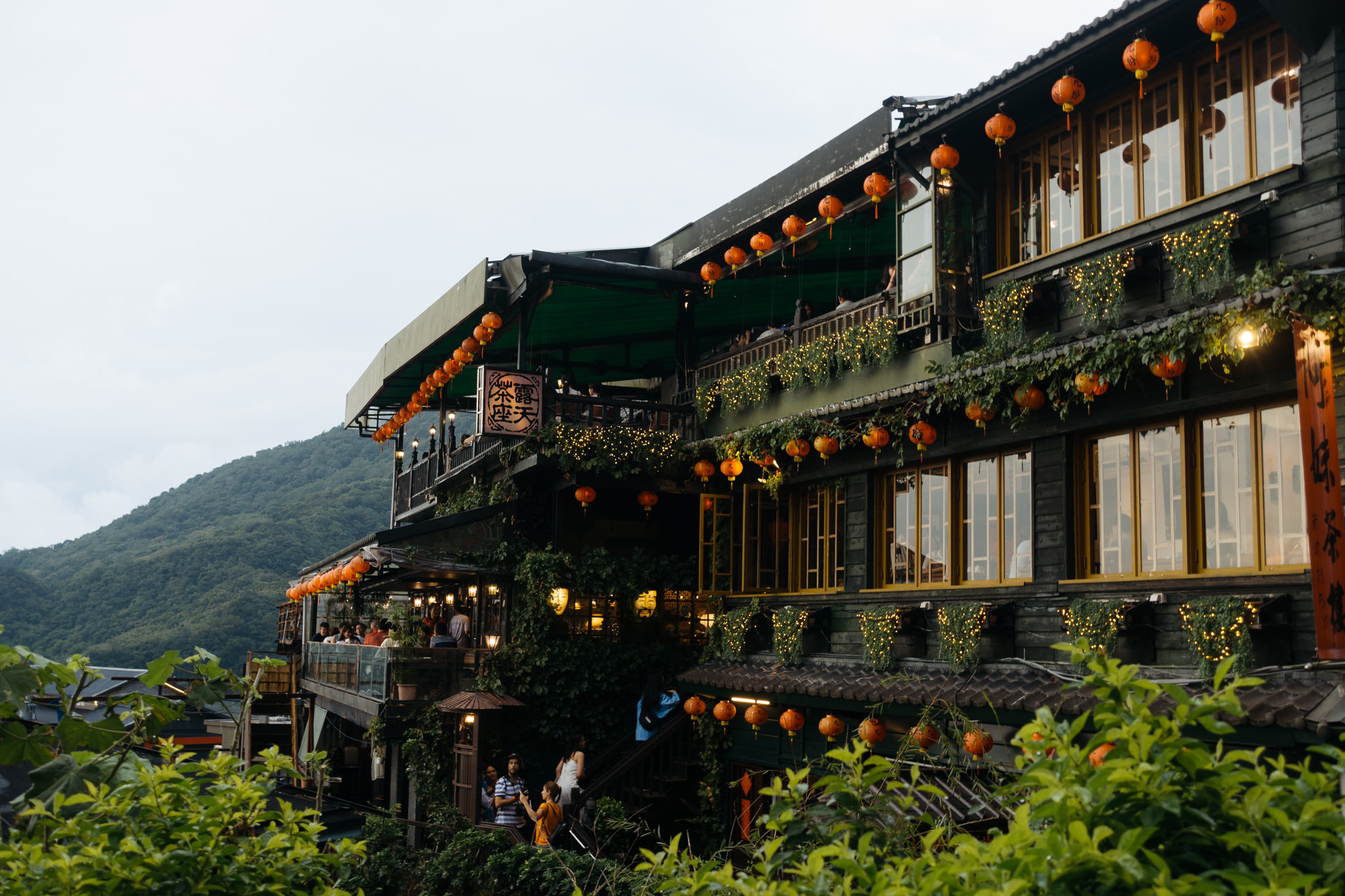 Jiufen, Taiwan building with orange lanterns.